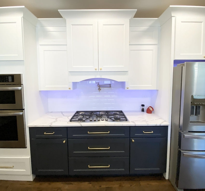 Real kitchen renovation with cabinets, countertops, and tile sourced through Emerald Fern Finishes.