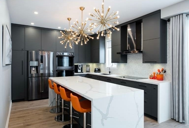 Contemporary kitchen charcoal slab cabinets waterfall quartz gold sputnik chandelier