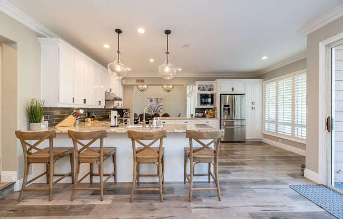 Open concept kitchen remodel by Rose Hill Cabinets — seamless flow between kitchen and living space with custom cabinetry