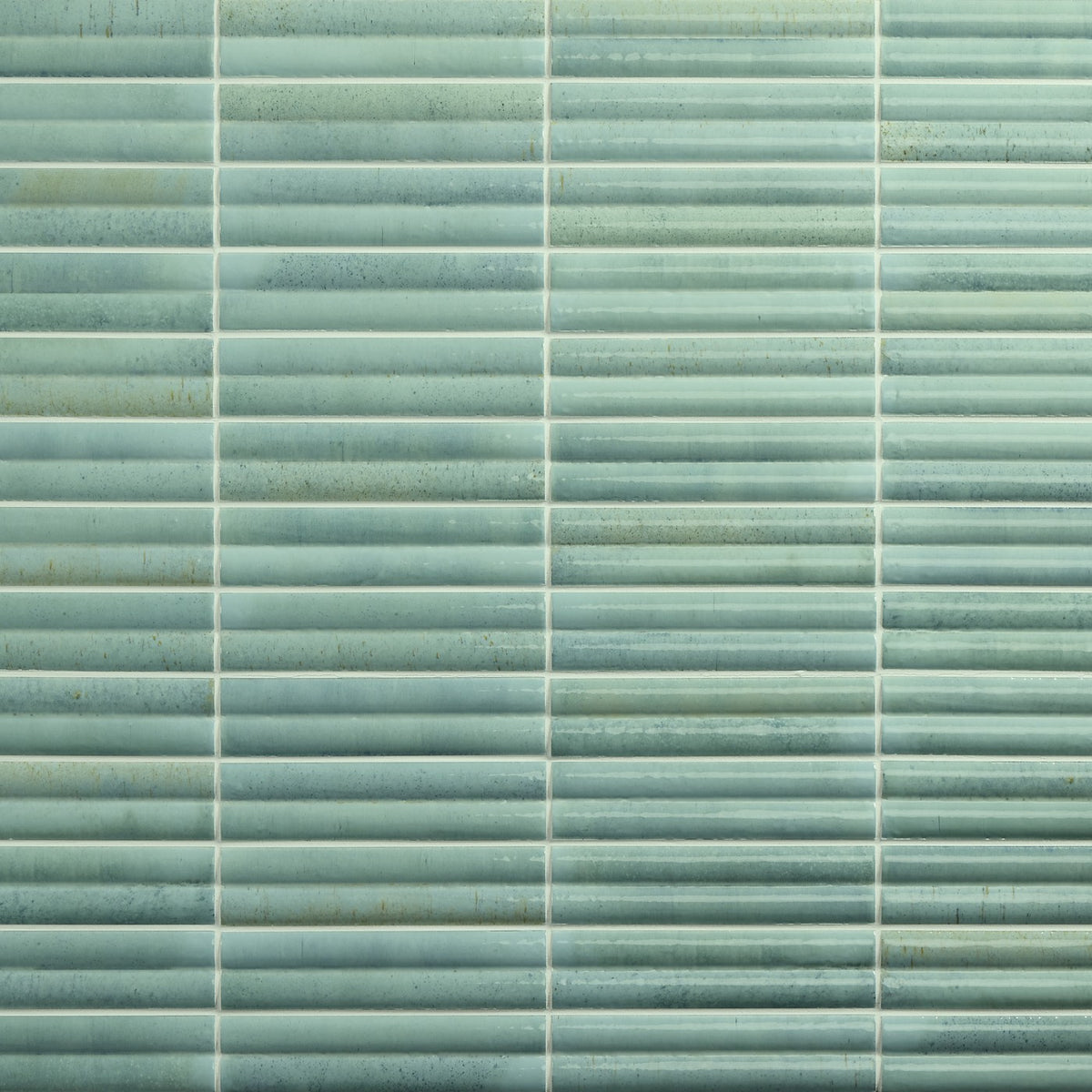 Daltile Remedy Vitality 2″×10″ glossy fluted glazed porcelain wall tile