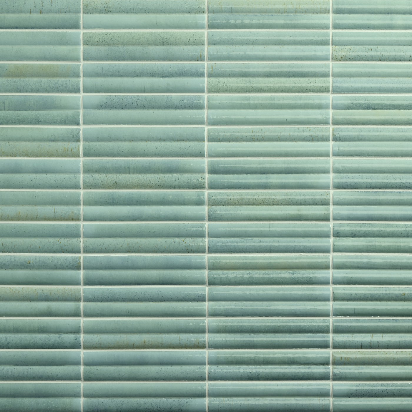 Daltile Remedy Vitality 2″×10″ glossy fluted glazed porcelain wall tile