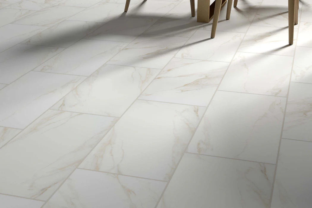 Large format white marble porcelain floor tile with gold veining