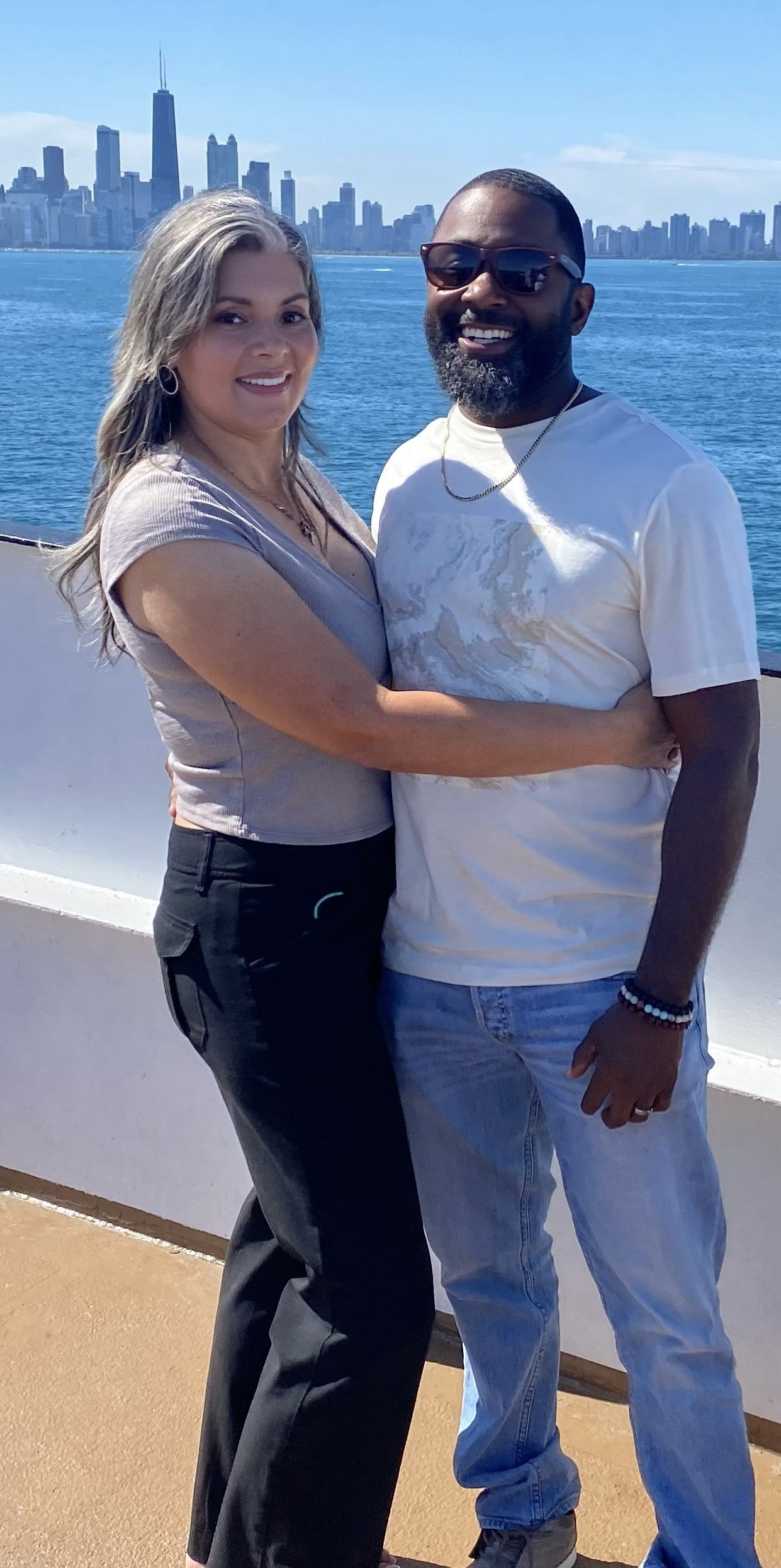 Camille and Marcus Johnson, founders of Emerald Fern Finishes, on the Chicago lakefront — Black-owned building products and cabinetry company serving across the United States.