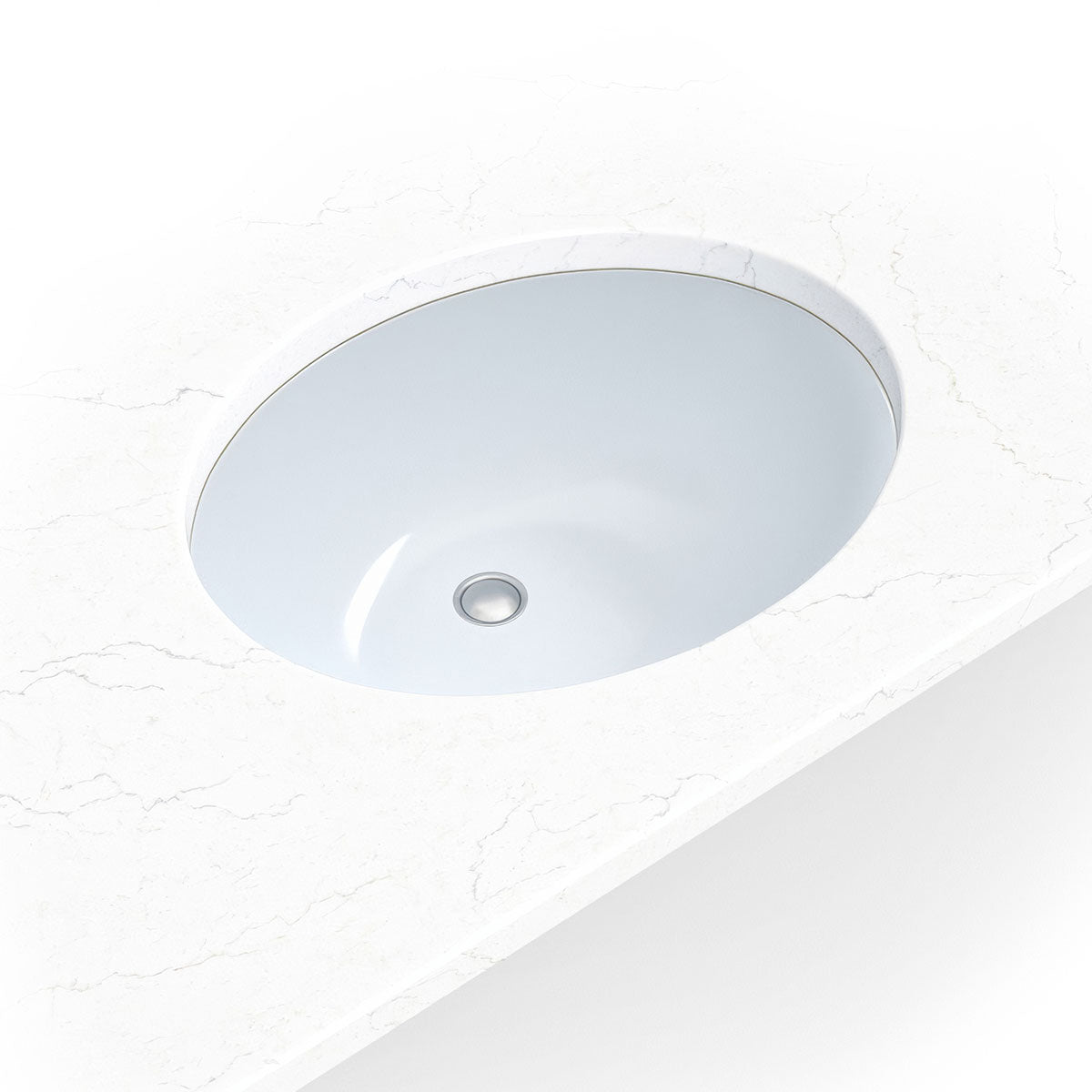 White porcelain oval undermount vanity sink shown in a bathroom scene