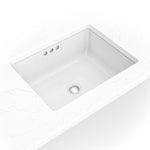 MSI white porcelain flat-bottom rectangular undermount bathroom sink installed in a vanity
