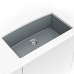 MSI quartz composite single-bowl kitchen sink in gray in a kitchen setting