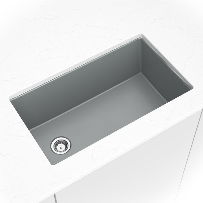 Matte gray quartz single-bowl kitchen sink shown in a kitchen scene