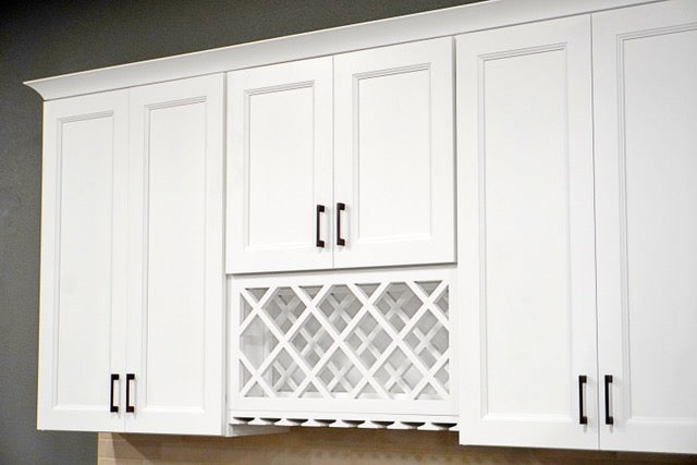 Rose Hill Cabinets white shaker wall cabinets with built-in wine rack lattice insert and dark hardware