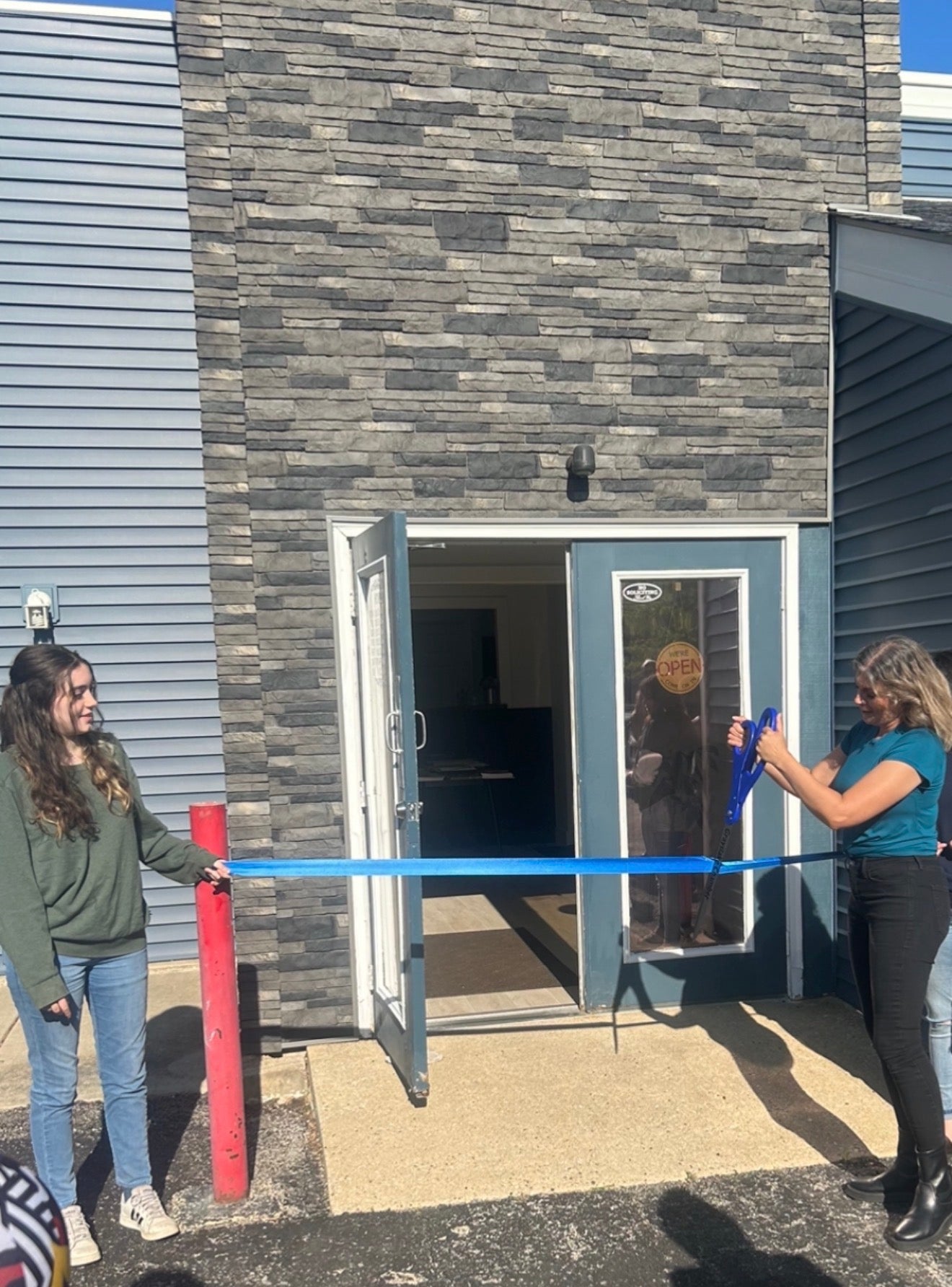Lotus showroom ribbon cutting