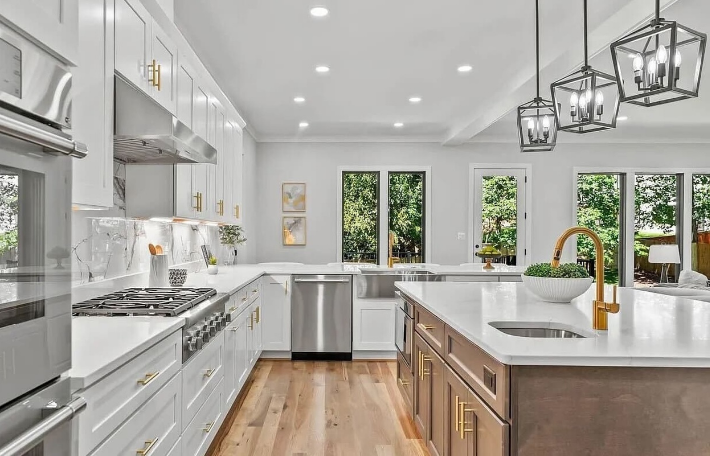 Finished kitchen with warm wood flooring