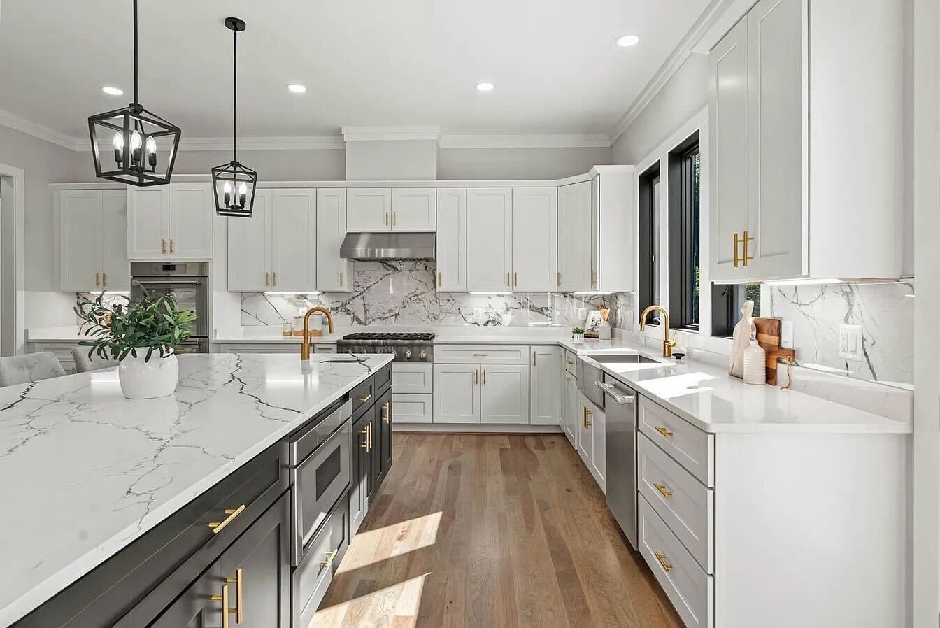 Finished kitchen with a decorative cabinet-style range hood