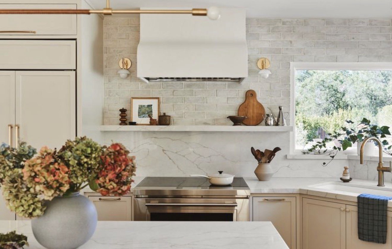 Kitchen with coordinated tile and cabinetry