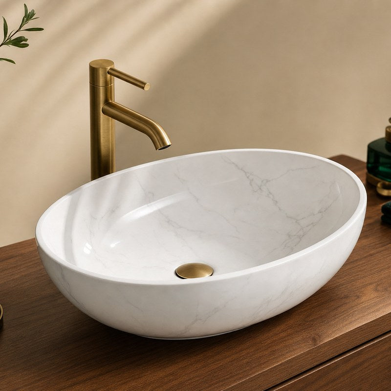 Bathroom sink and faucet installed on a vanity