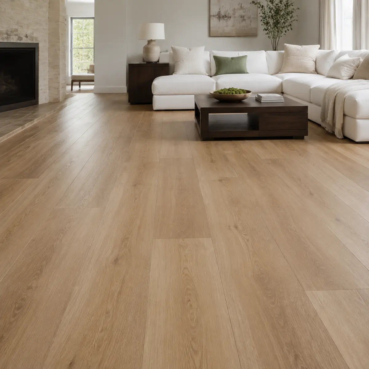 Wide-plank wood-look luxury vinyl flooring in a finished living room