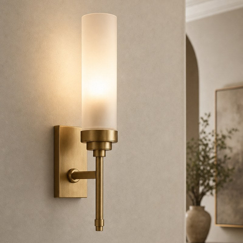 Wall sconces adding layered light to a finished room